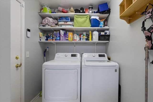 laundry room with washer and dryer