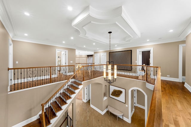 interior space featuring ornamental molding, recessed lighting, baseboards, and an inviting chandelier