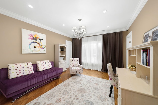 living area featuring recessed lighting, an inviting chandelier, wood finished floors, and crown molding