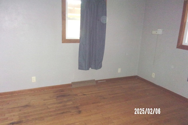 empty room featuring hardwood / wood-style floors