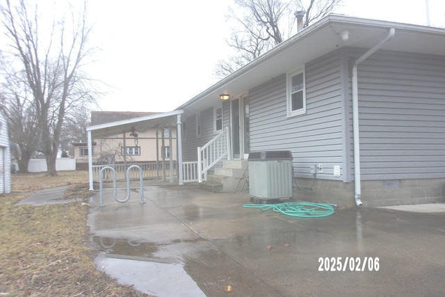 exterior space with central air condition unit