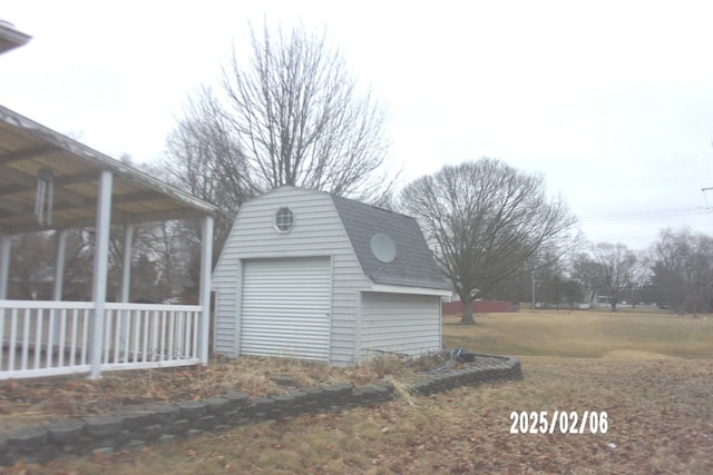 garage with a lawn