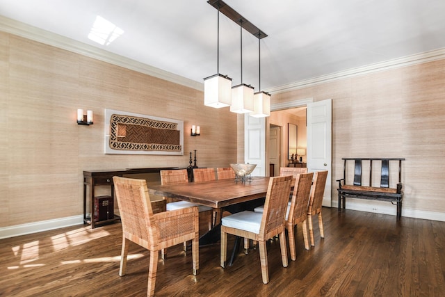 dining room featuring hardwood / wood-style flooring and crown molding