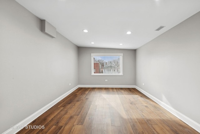 empty room featuring hardwood / wood-style floors