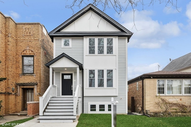 view of front of house with a front lawn