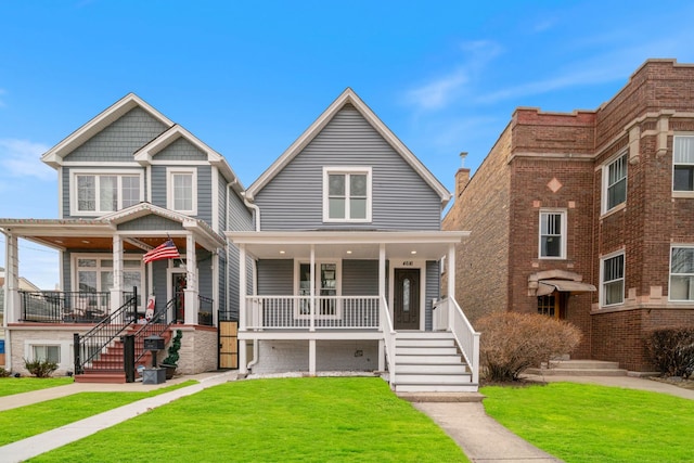 view of front of house featuring a porch and a front yard