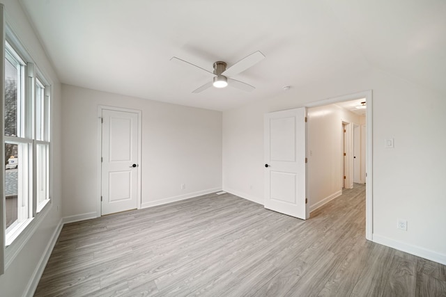 unfurnished room featuring ceiling fan and light hardwood / wood-style floors