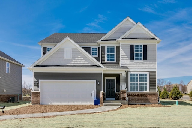 craftsman-style home featuring central AC, brick siding, a shingled roof, and a garage