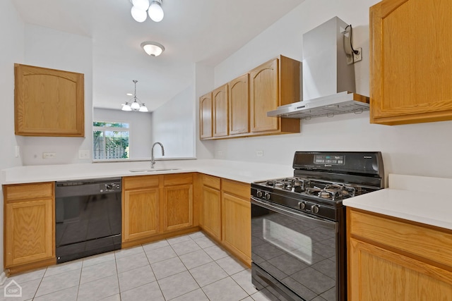 kitchen with sink, hanging light fixtures, light tile patterned floors, black appliances, and wall chimney range hood