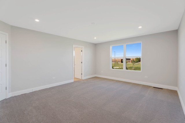 view of carpeted spare room