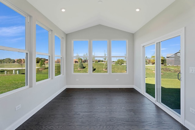 unfurnished sunroom with lofted ceiling