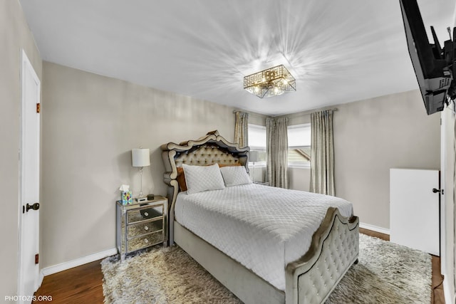 bedroom featuring dark hardwood / wood-style floors