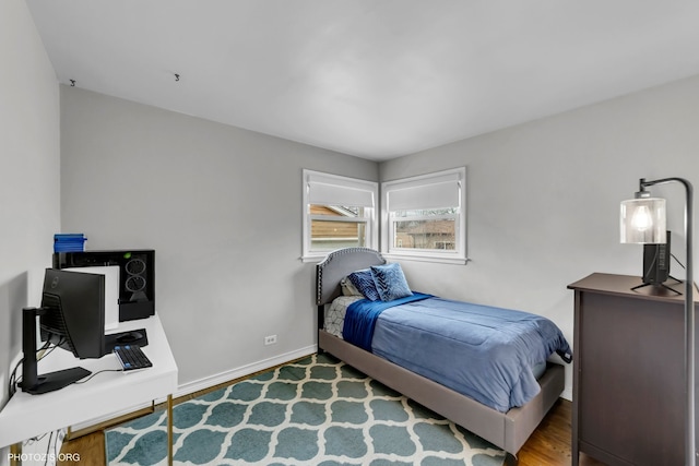 bedroom featuring light wood-type flooring