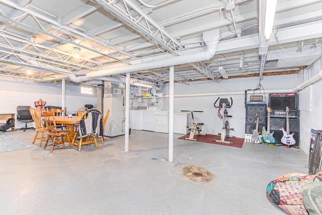 basement featuring washer and dryer