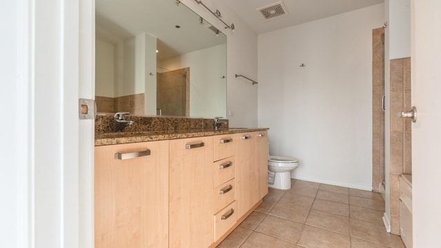 full bathroom with tile patterned flooring, toilet, visible vents, a shower stall, and double vanity