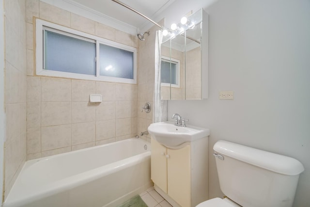 full bathroom featuring toilet, tiled shower / bath, ornamental molding, vanity, and tile patterned flooring