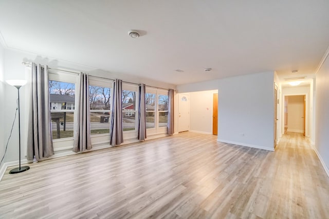 unfurnished room featuring light wood-type flooring