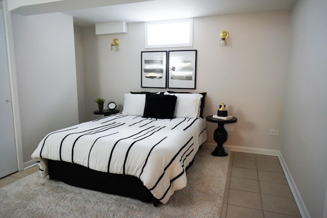 tiled bedroom with an AC wall unit