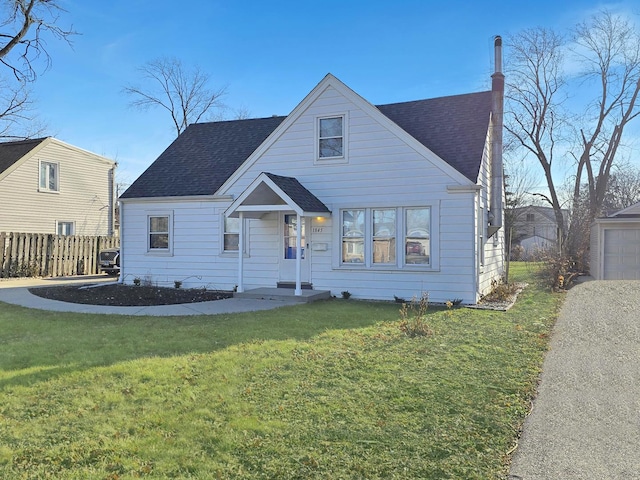 bungalow-style house featuring a front yard