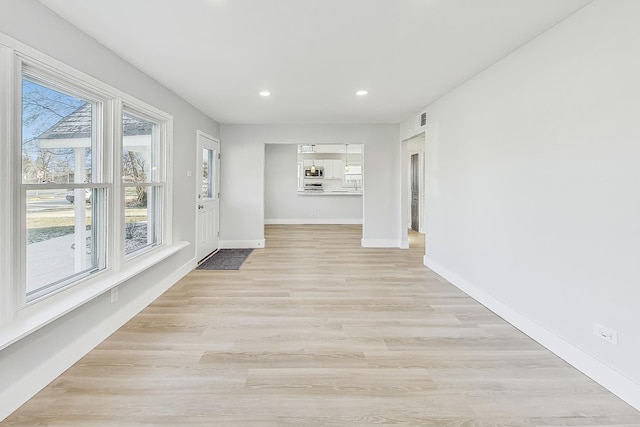 interior space with light hardwood / wood-style floors