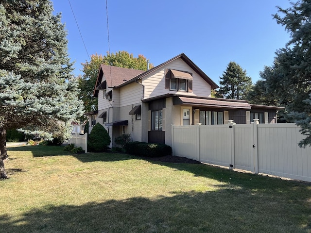 view of home's exterior featuring a lawn