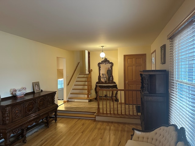 sitting room with hardwood / wood-style flooring