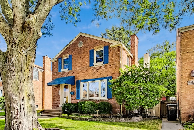 view of front of home with a front yard