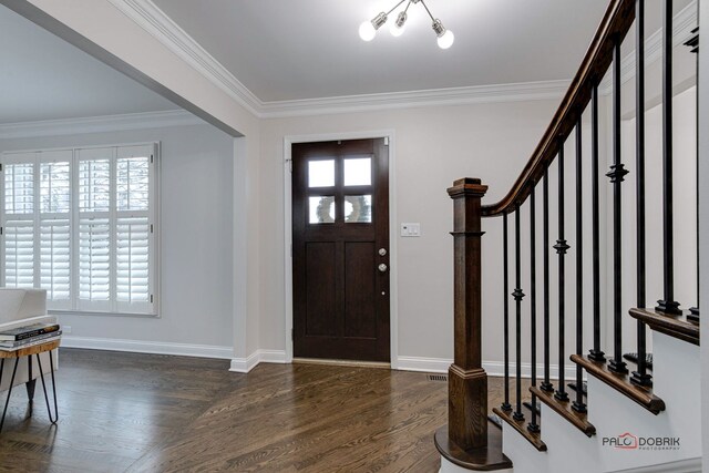 living room with dark wood-type flooring and a chandelier