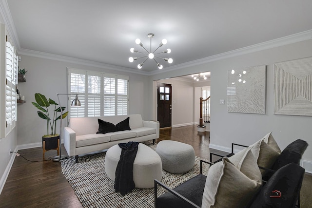 living room featuring ornamental molding, dark hardwood / wood-style floors, and a chandelier