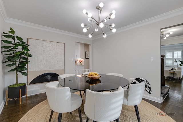 dining space featuring dark hardwood / wood-style flooring, ornamental molding, and a chandelier