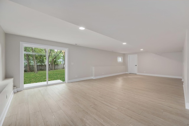 spare room featuring light hardwood / wood-style floors