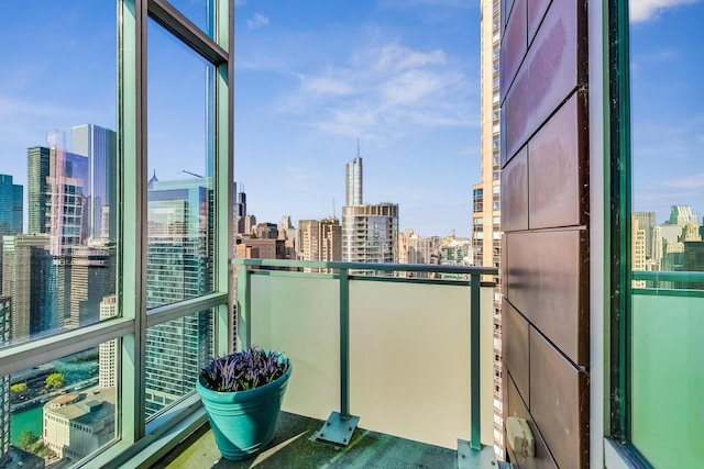 balcony featuring a city view