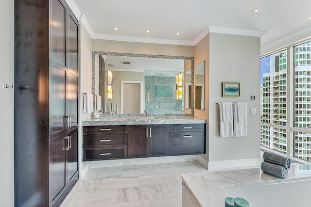 bathroom with marble finish floor, a shower stall, vanity, and crown molding