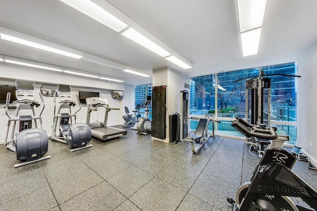 workout area with floor to ceiling windows