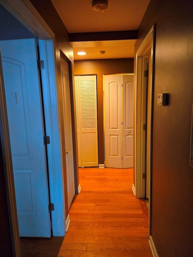 hallway featuring light wood-type flooring