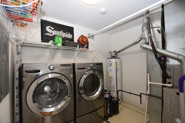 laundry room with separate washer and dryer, gas water heater, tile patterned floors, and heating unit