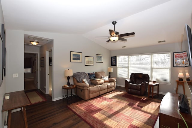 living room featuring lofted ceiling, dark hardwood / wood-style floors, and ceiling fan