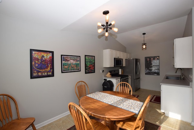 dining area featuring lofted ceiling, sink, a notable chandelier, and light tile patterned flooring