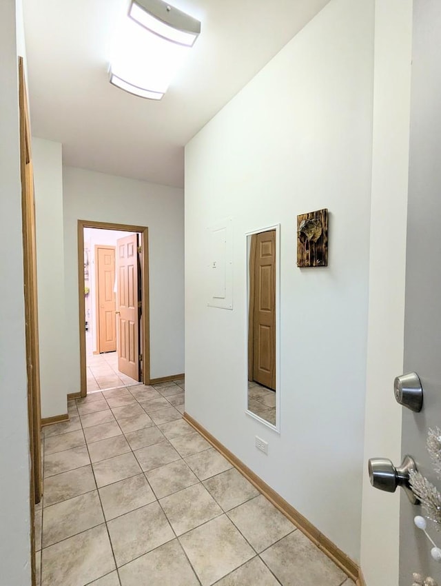 hallway with light tile patterned flooring