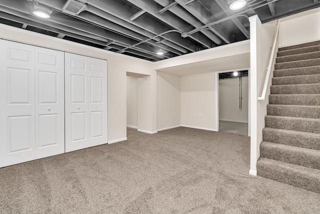 basement featuring carpet flooring