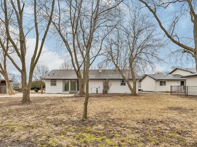 back of house with a patio area