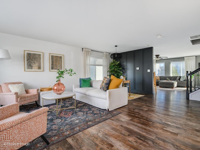 living room with dark wood-type flooring