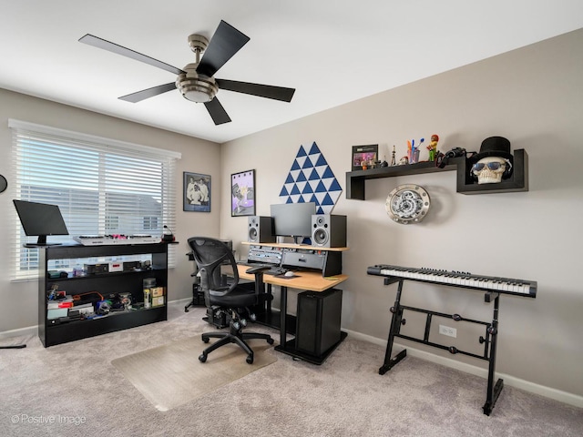 office area with ceiling fan and light carpet