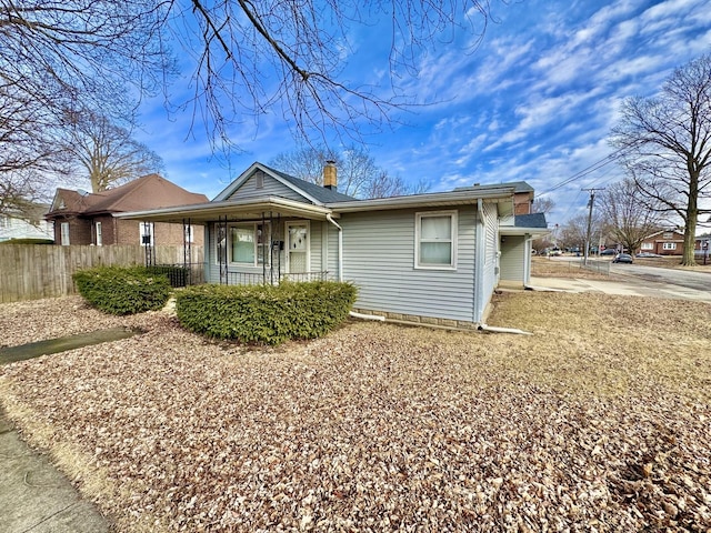 ranch-style home with covered porch