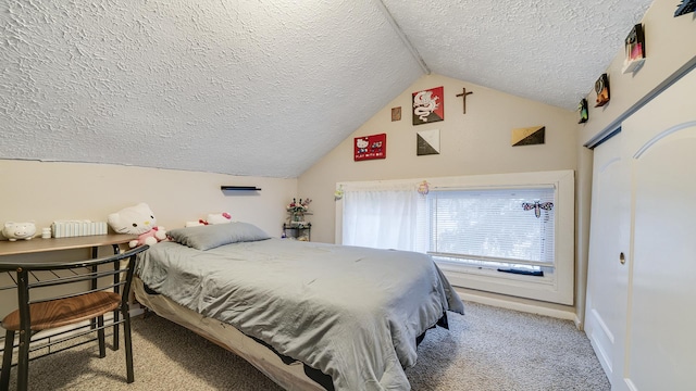 carpeted bedroom featuring vaulted ceiling, a closet, and a textured ceiling