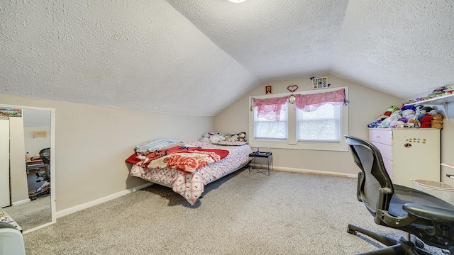 bedroom featuring lofted ceiling, a textured ceiling, and carpet