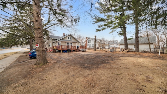 view of front facade featuring a wooden deck