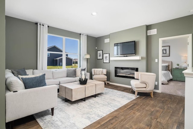 living room with dark wood-type flooring