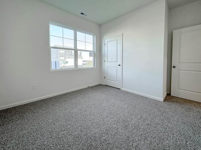 empty room with carpet floors