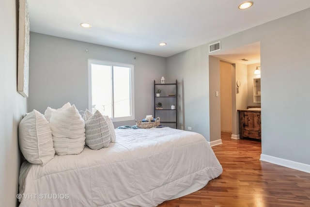 bedroom featuring wood-type flooring